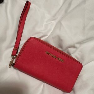 Michael Kors wristlet. Coral color.